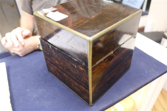 An Aspreys coromandel four-decanter box, fully-fitted, with liqueur glass and retailers label 22 x 22cm